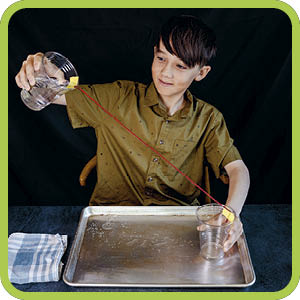 boy doing experiment